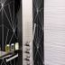 Retreat At Crystal Manatee shower with black geometric tile and white textured wall in Crystal River