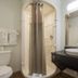 Motel 6 Lakewood, Co - Denver bathroom with shower, toilet, sink and mirror