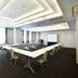 Chisun Hotel Koriyama meeting room in Kōriyama with U-shaped conference table and projector screen