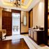 Changle Inn in Yangzhou room with open doorway to a balcony and visible bed area