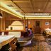 Hotel Leipziger Hof in Innsbruck restaurant with wood-paneled dining room and set tables