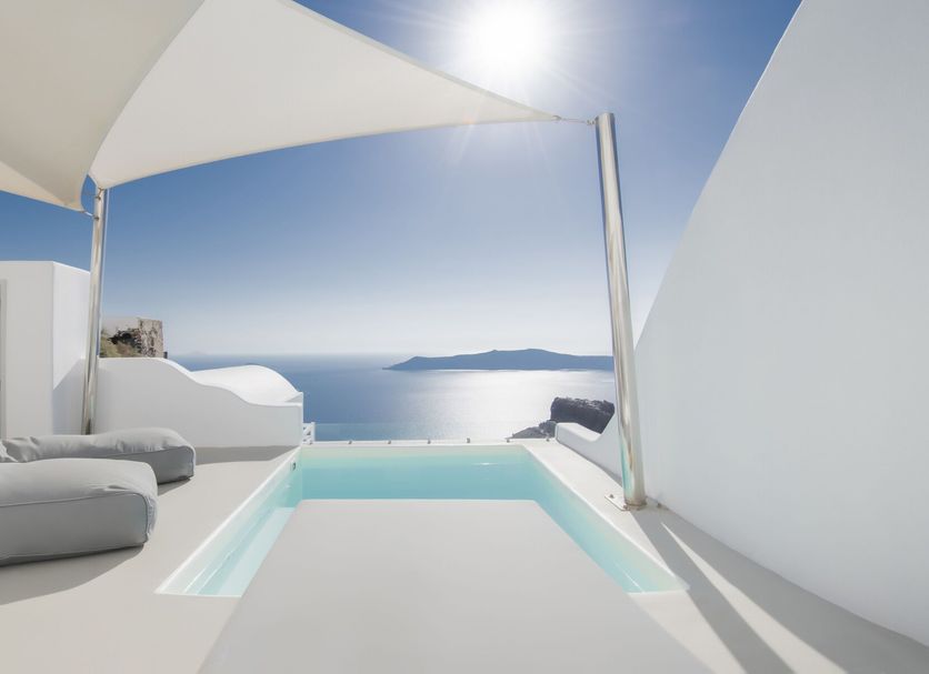 Hotel Sunny Villas in Thera with a private plunge pool and sea view under a shaded terrace