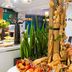 ibis Antananarivo Ankorondrano breakfast buffet with fresh pastries and plants in Antananarivo