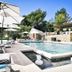 Le Palais d'Aglaé, Hôtel de Charme in Gordes: outdoor pool with sun loungers, umbrellas and poolside terrace