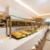 Niriides Beach in Kolympia buffet dining area with salad trays and long white counter