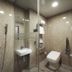 Benikea Hotel Haeundae, Busan bathroom with glass shower, wall-mounted sink and toilet