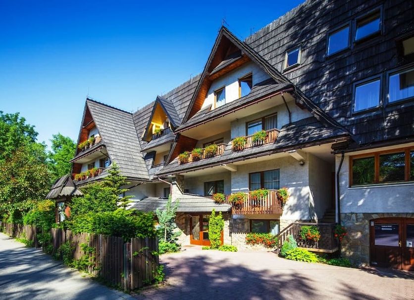 Czarny Potok Wellness & Spa Zakopane Centrum in Zakopane, alpine-style hotel exterior with balconies