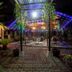 Nighttime courtyard dining area at Hotel Seri Malaysia Johor Bahru with lit pavilion and fountain