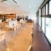 Super Hotel Inn Sendai Kokubuncho breakfast lounge with tables and chairs in Sendai