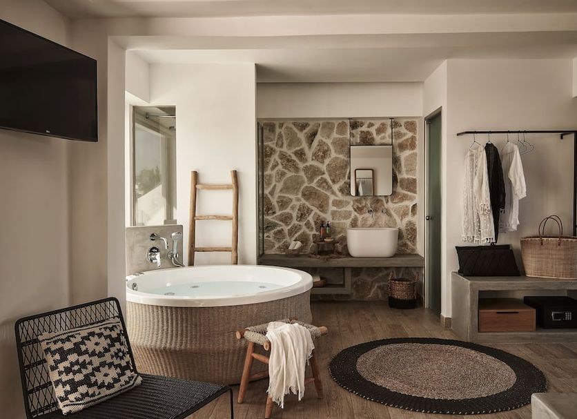 Casa Cabana Boutique Hotel & Spa in Faliraki: spa suite with round soaking tub and stone shower