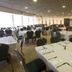 C Hotel Tiberias banquet hall with set dining tables and chairs in Tiberias
