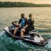 Auberge Villa Bellerive in Nominingue with guests riding jet skis on a lake at sunset