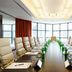 Hilton Kyiv meeting room with long conference table and leather chairs by floor-to-ceiling windows