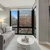 Coda on Half, a Placemakr Experience - Navy Yard in Washington, D.C. living room with city-view corner windows