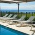 Hillsboro Beach Resort By Kasa poolside loungers with ocean view in Hillsboro Beach