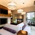 Hilton Garden Inn Auburn Lewiston Riverwatch lobby with fireplace, seating area, and river view windows