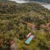 Posada Puerto Bemberg in Puerto Libertad with a pool amid lush forest beside the river