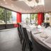 Hotel Seehof Walenstadt dining room with set tables and lake view through large windows
