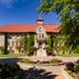 St. Eugene Golf Resort & Casino in Cranbrook, ivy-covered historic hotel with red roof and landscaped grounds