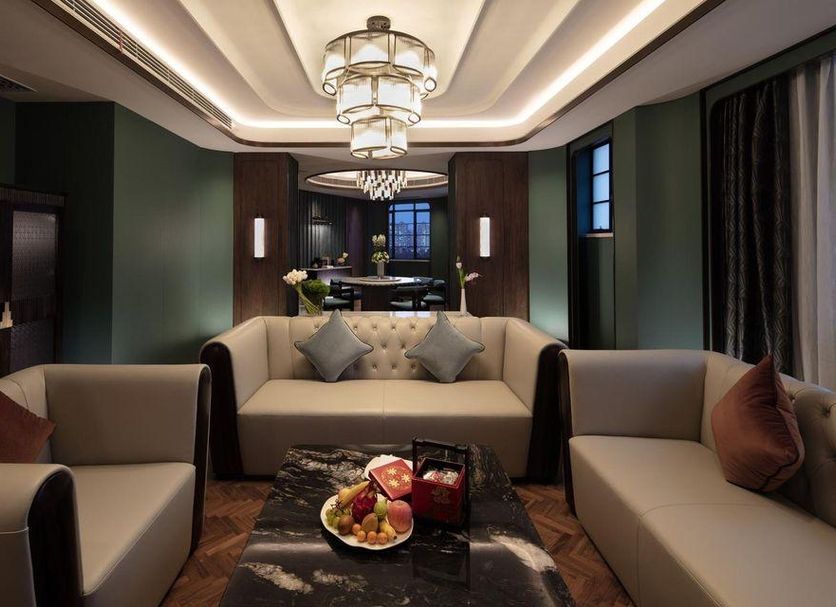 Hengshan Garden Hotel in Shanghai lounge with beige sofas, chandelier, and a coffee table centerpiece