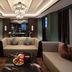 Hengshan Garden Hotel in Shanghai lounge with beige sofas, chandelier, and a coffee table centerpiece