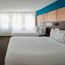 Residence Inn by Marriott Montreal Downtown guest room with two beds and large window light in Montreal