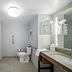 Hampton Inn & Suites Ft. Lauderdale West-Sawgrass/Tamarac Tamarac bathroom with walk-in shower, toilet and vanity