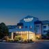 Fairfield Inn & Suites by Marriott Brunswick Freeport exterior at dusk with lit entrance in Brunswick