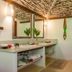 Pousada Estrela D' Agua Trancoso bathroom with double sink vanity and green tile shower