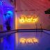 Casa Ticul Hotel By Bfh in Playa del Carmen, indoor pool with colorful lighting and wall art
