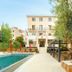 Hotel Aquarius Dubrovnik in Dubrovnik with outdoor pool, terrace seating and garden walkway