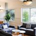 Elizabethan Lodge in Blackburn lounge with sofas, coffee tables, floral arrangement and diamond-paned windows