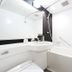 Hotel Villa Fontaine Tokyo-Nihombashi Hakozaki bathroom with bathtub, sink, and bright white modern design