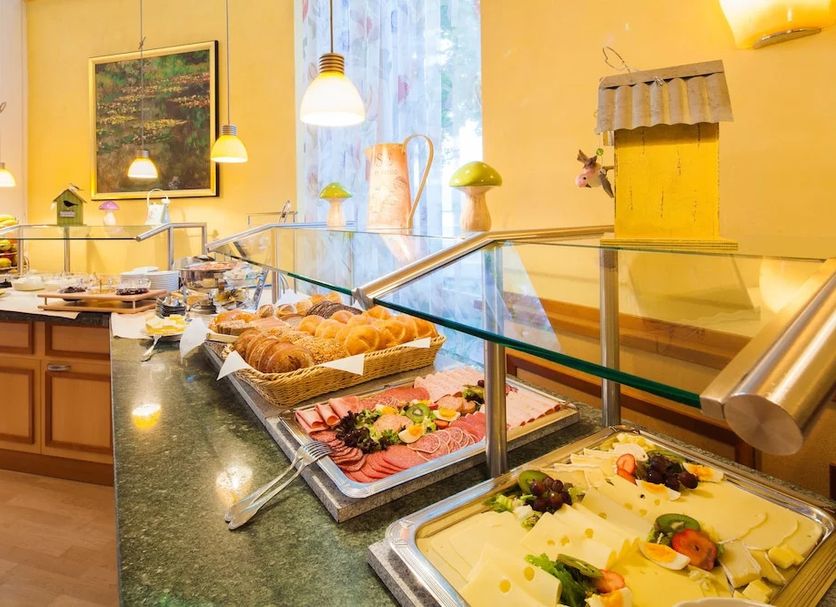 Gda Hotel Hildastift Am Kurpark, Wiesbaden breakfast buffet with pastries, fruit and cold dishes