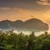Chongkhao Resort in Ko Phi Phi with tropical hillside view over a bay at sunset