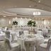 Portsmouth Marriott Hotel in Portsmouth ballroom with round banquet tables and white chair covers