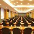 Guohao Hotel in Shijiazhuang conference room with rows of tables and chairs