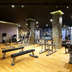 TRS Coral Hotel in Cancún fitness center with treadmills, weights and strength machines