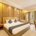 Sterling Amargarh Jodhpur room with king bed, seating area and balcony-style windows in Jodhpur