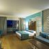 Terrace Elite Resort in Side guest room with balcony view, twin beds, seating area and wood flooring