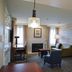 Residence Inn by Marriott La Mirada Buena Park suite with fireplace, desk, seating area and bedroom doorway in La Mirada