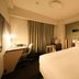 Richmond Hotel Tokyo Suidobashi guest room with double bed, desk and chair in Tokyo