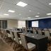 City Express by Marriott Washington, DC Northeast meeting room with long conference tables and projector screens