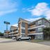 MainStay Suites Knoxville - Cedar Bluff in Farragut, exterior view of the hotel building and parking lot