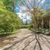 Siddhalepa Ayurveda Resort in Molligoda with a shaded driveway and pavilion-style entrance