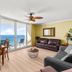 Emerald Beach Resort in Panama City Beach suite with ocean view, balcony doors, and seating area