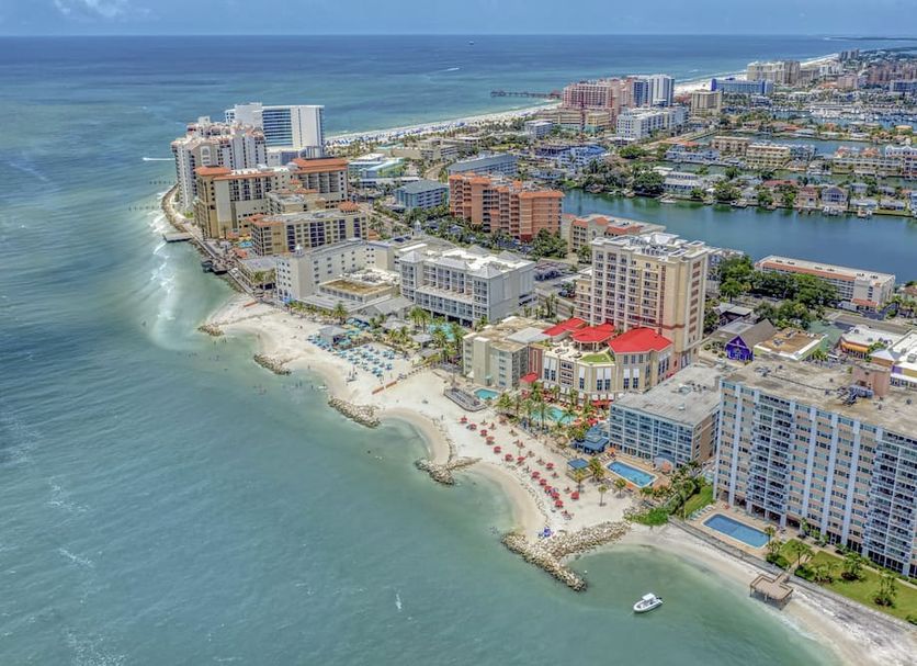 Dolphin Sands Clearwater Beach, an Ascend Collection Hotel beachfront aerial view over Clearwater Beach