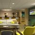 Holiday Inn St Louis SW - Route 66 lobby lounge with seating and bar in St. Louis