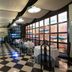 Rhi Porta Bologna in Pieve di Cento dining room with black-and-white checkered floor and set tables