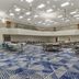 Best Western Plus Rose City Conference Center Inn in Thomasville meeting hall with blue patterned carpet and banquet tables